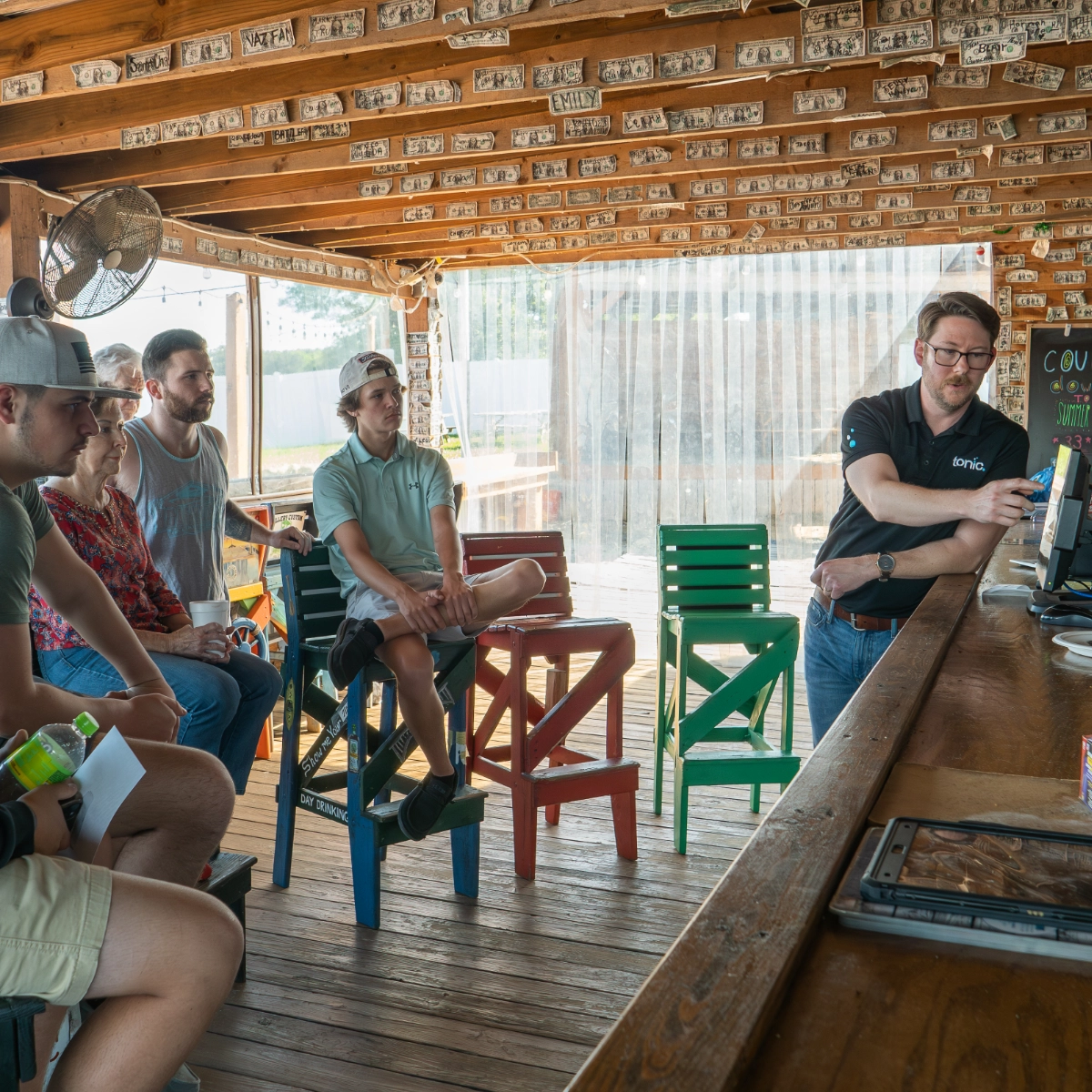 Hands-on training session for restaurant staff on the Tonic POS platform.